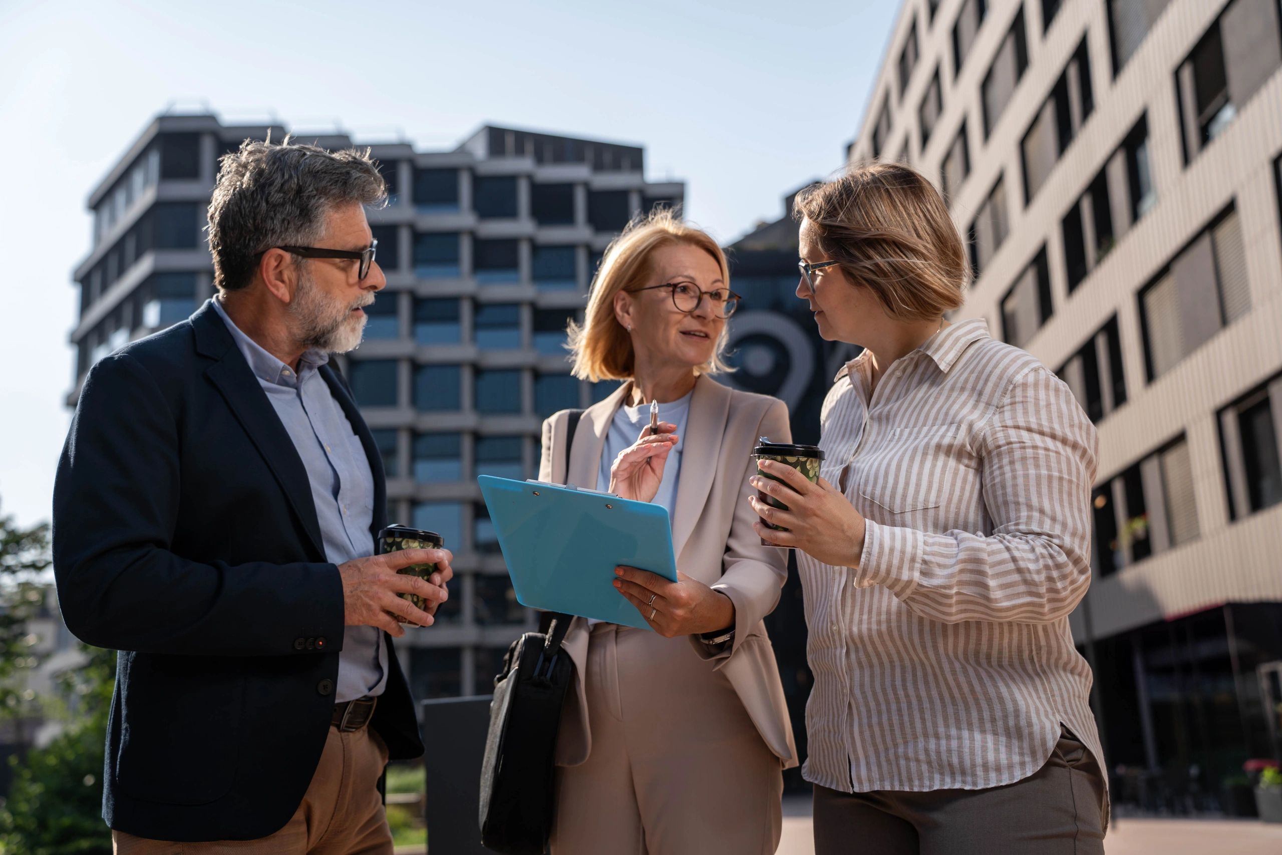 senior business meeting outdoors